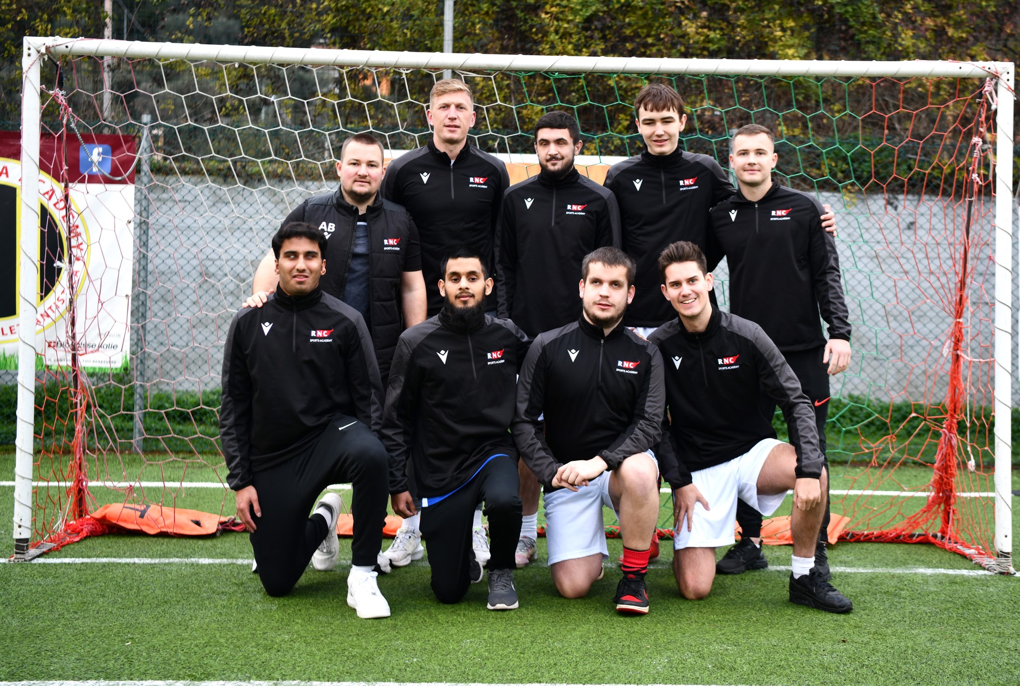 The team line up in the goal