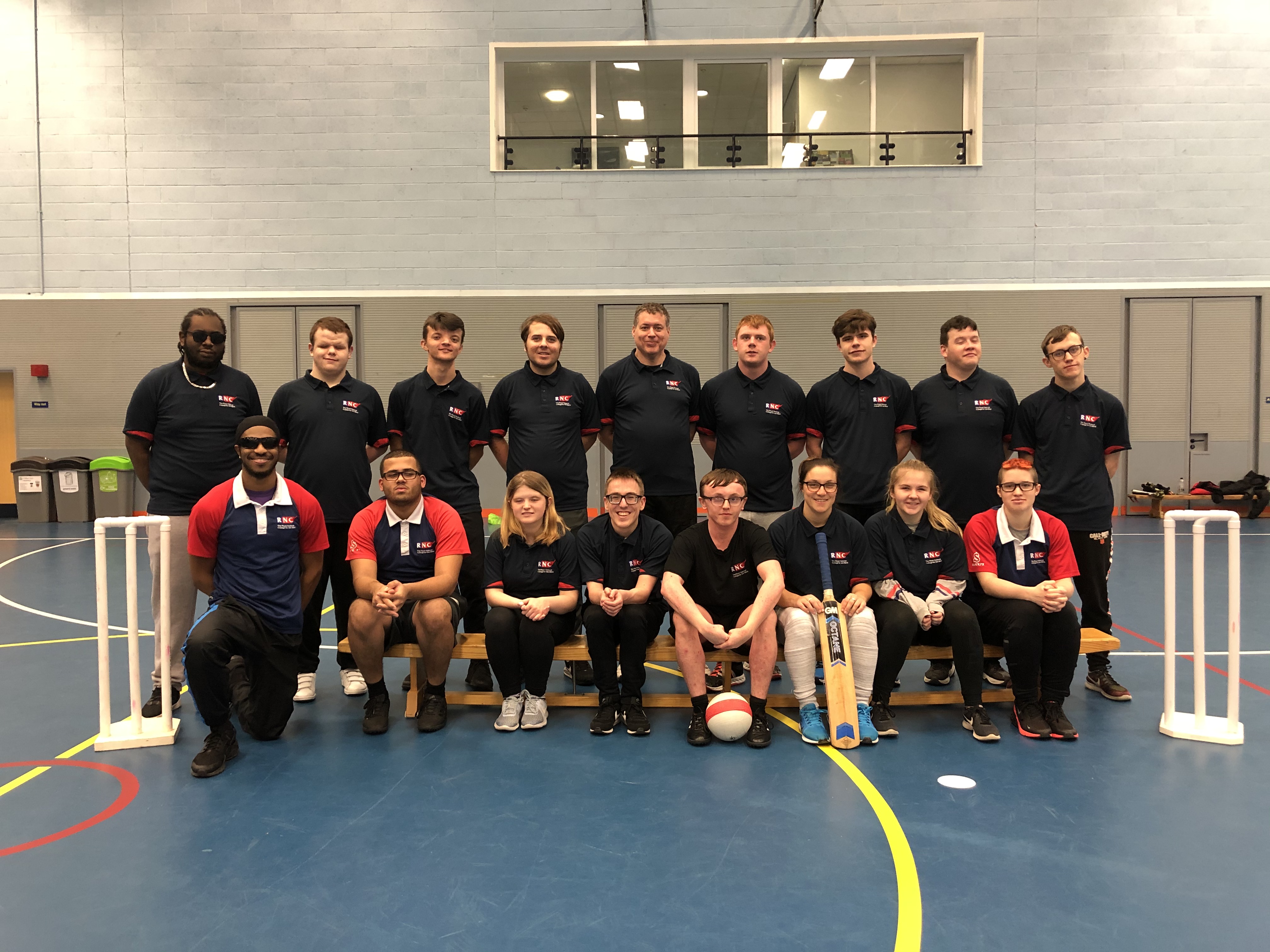 the RNC Bulldogs VI Cricket team line up for a group photo