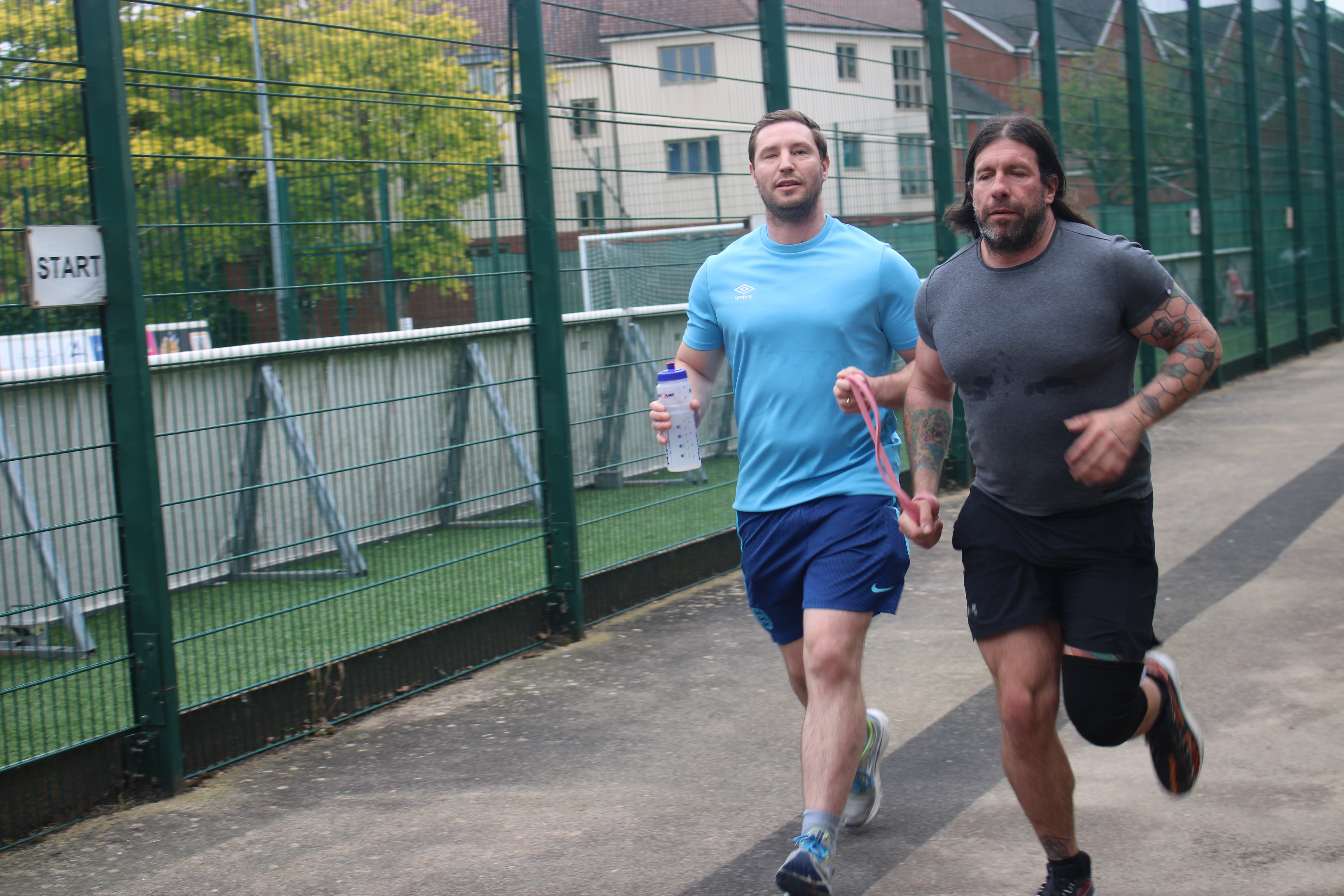 Owen and Gareth tethered starting off a run outside