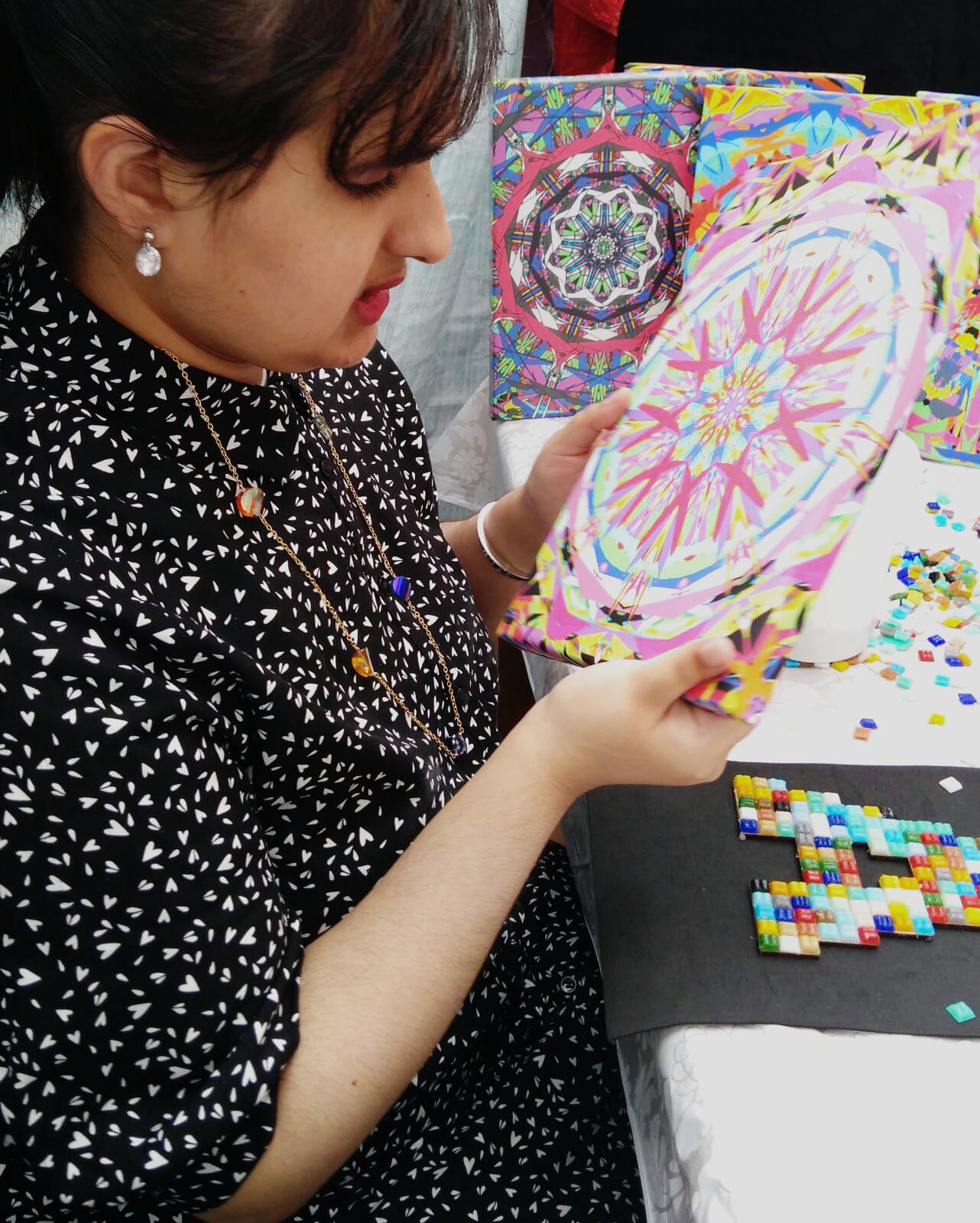 Amirah working on some of her kaleidoscope artwork