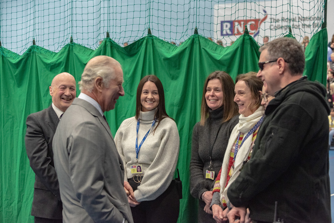 The King talking to the long serving residential staff